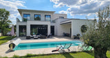 Piscine Chauffée à La Norville avec Cuisine d'Été et Jardin 2